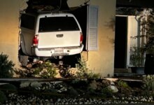 Authorities Probe Residential Fire and Vehicle Collision Incident in Bay Park Neighborhood