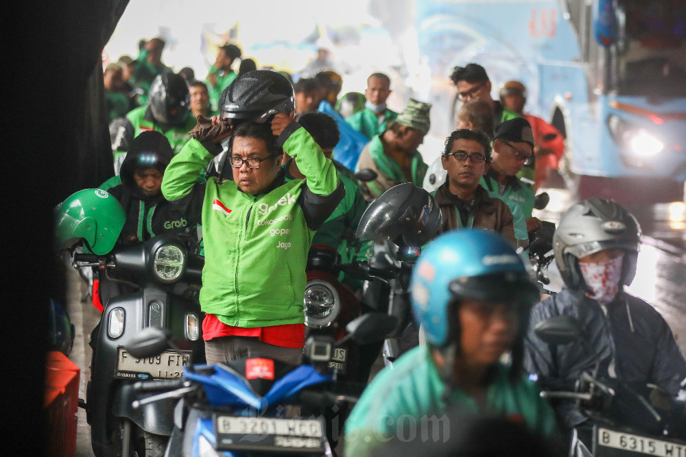 Setumpuk Catatan di Tengah Kuatnya Wacana Merger Gojek-Grab: Fakta dan Implikasi